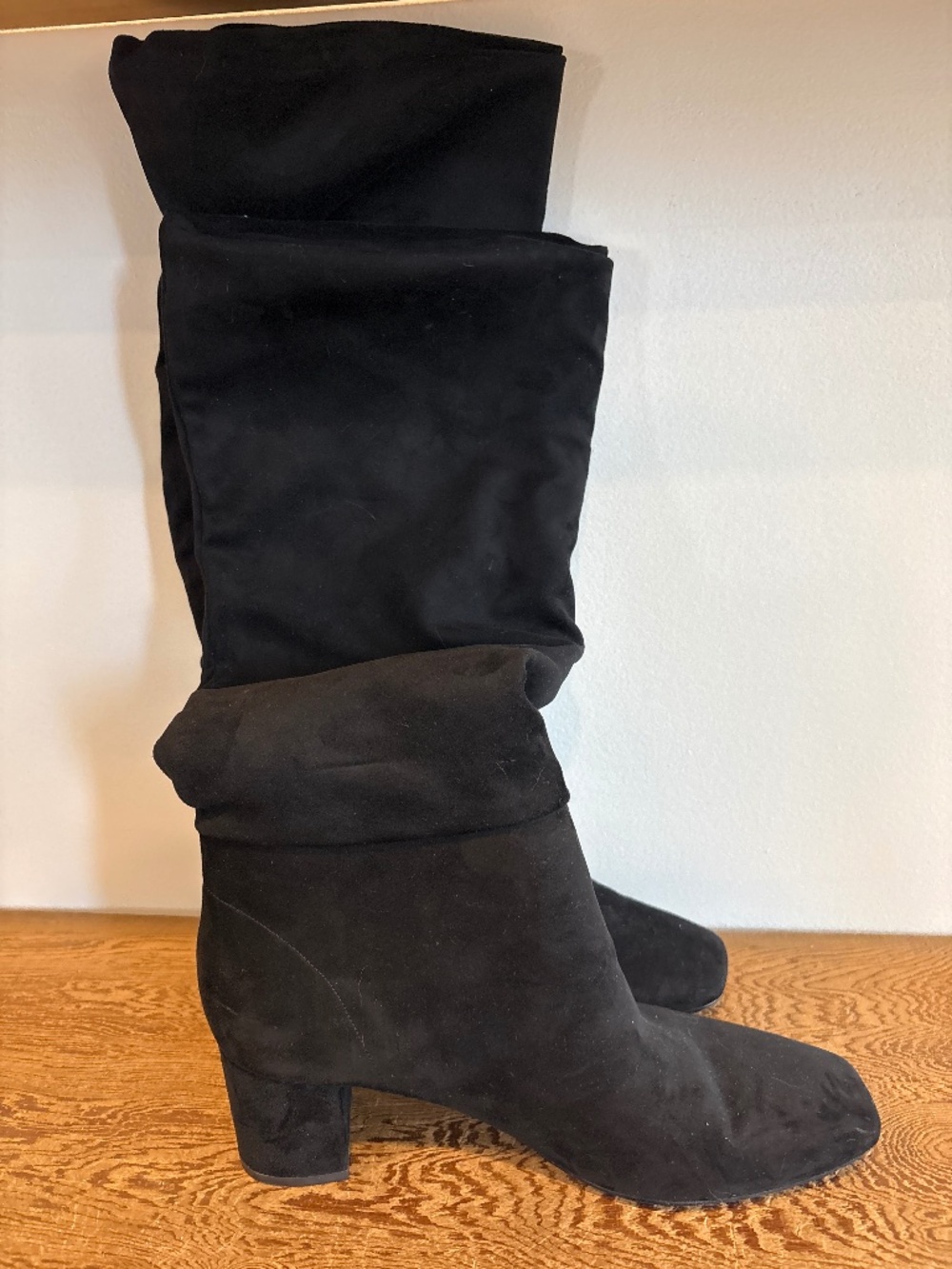 Tall healed black boots